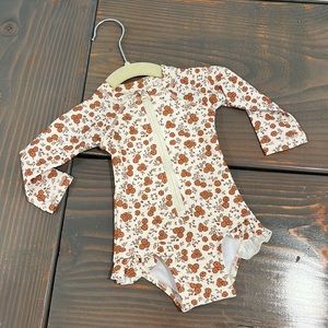New rylee and Cru swim suit 0-3 m. Adorable floral print with tags still on!